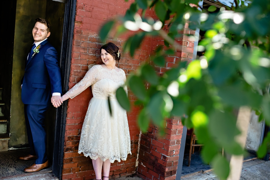 A couple enjoy a First Touch before the ceremony in South Philadelphia.