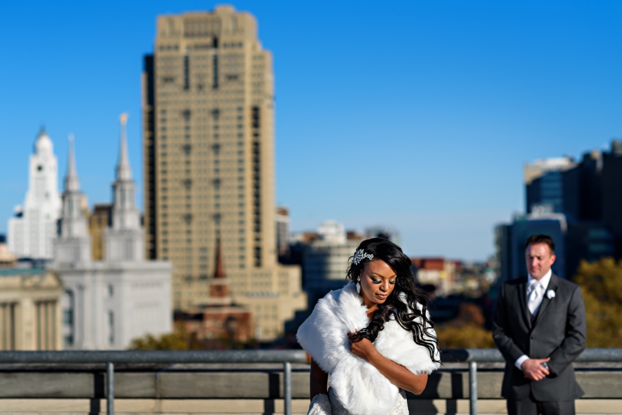 A bride and groom's first look on the rooftop of the Franklin Institute in Philadelphia.