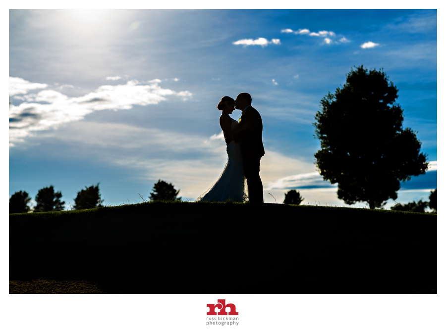 Wedding Couple enjoy a kiss right after their ceremony at Riverview Country Club Wedding.