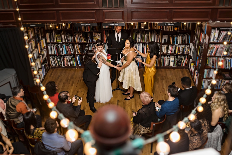 A lesbian wedding ceremony at the housing works bookstore in New York City.